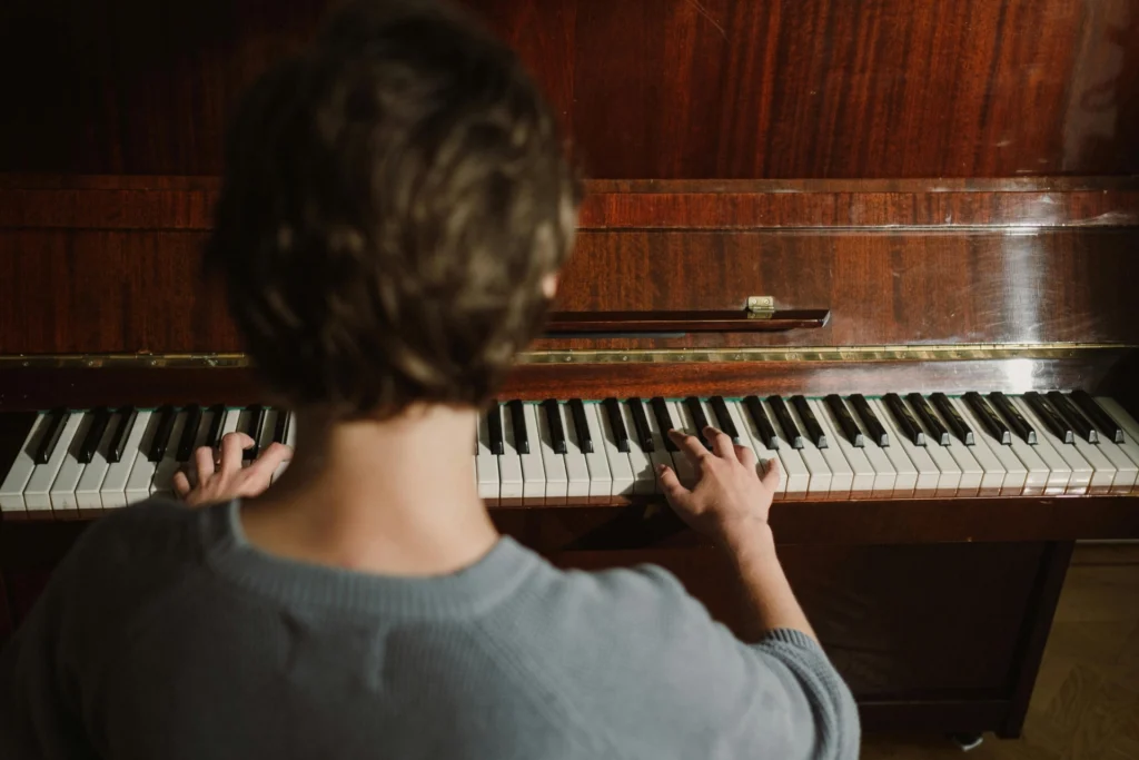 a person playing a piano