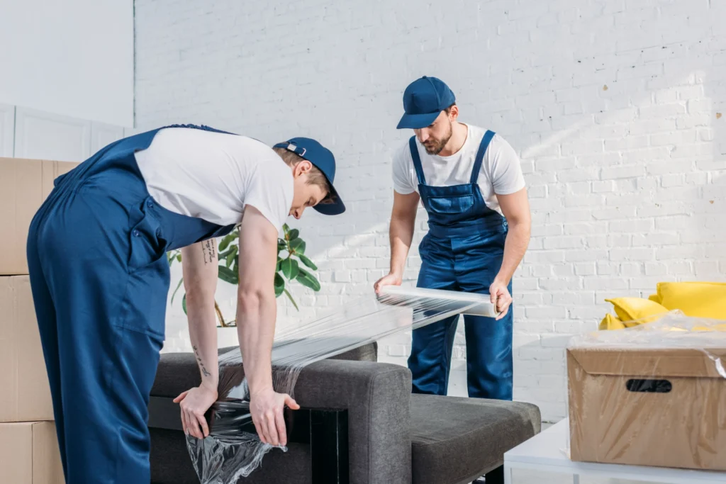 professional movers carefully handling furniture during a move in Springfield MA