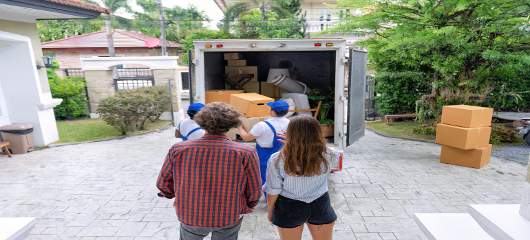 local movers in Springfield MA loading a moving truck on a residential street