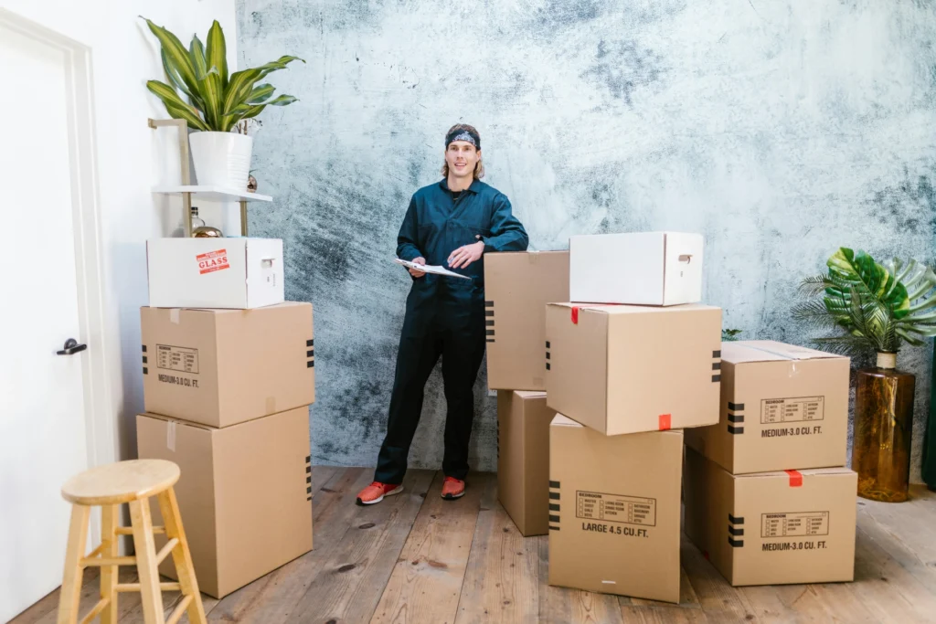 professional movers packing boxes for a local move in Greater Boston